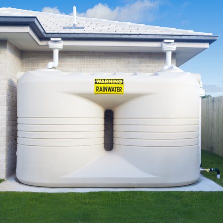 Large rain water tank in suburban backyard - Plumbing & Gasfitting Services in Dubbo, NSW