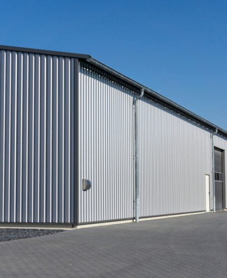 Warehouse with sheet metal cladding - Plumbing & Gasfitting Services in Dubbo, NSW