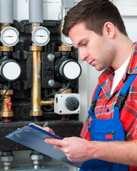 Gas Fitter Inspecting Gauges - Plumbing & Gasfitting Services in Dubbo, NSW